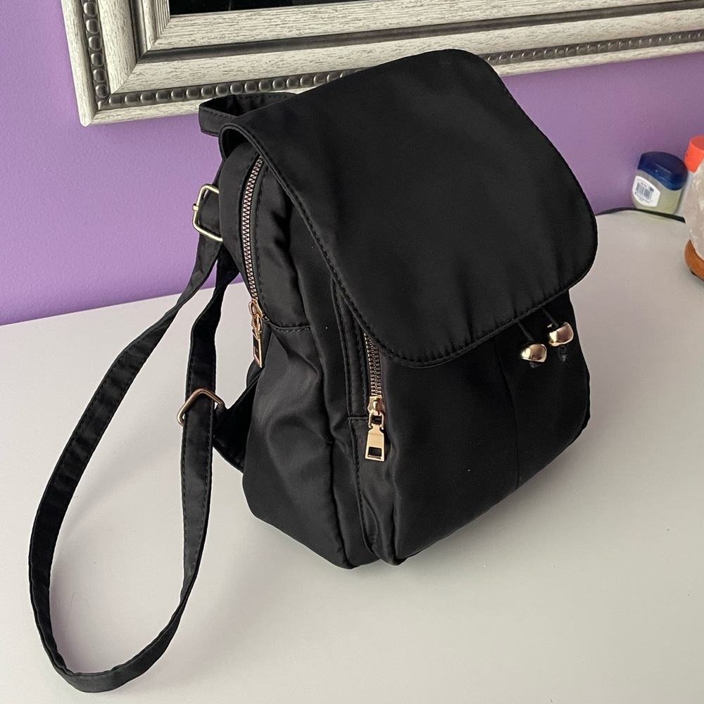 Medium size backpack with cheetah print lining - Picture 9 of 9